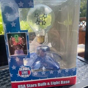 Vintage Fourth of July patriotic star light shines like neon